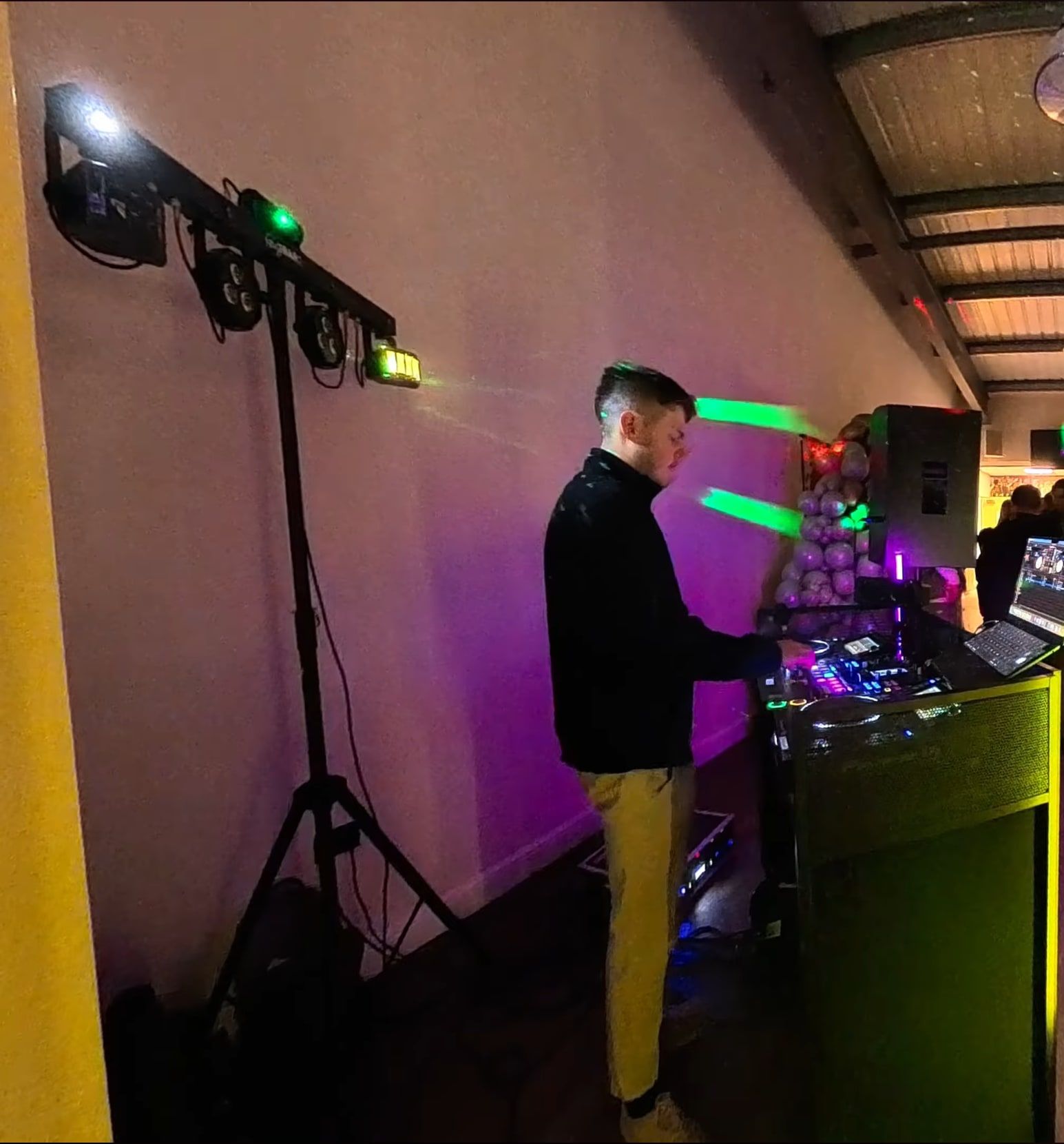 George at the decks at a wedding in Kent, with his own lighting rig and speakers set up around him